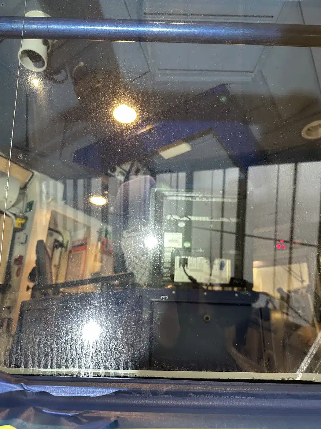 Another wheelhouse window, before polishing